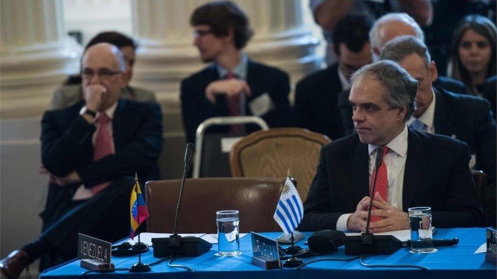 Uruguay's Under Secretary for Foreign Affairs Jose Luis Cancela sits next to Venezuela's empty seat during an OAS foreign ministers meeting on Venezuela in Washington, DC, on May 31, 2017.