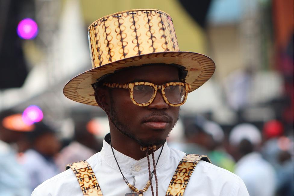 Man wearing a hat and glasses