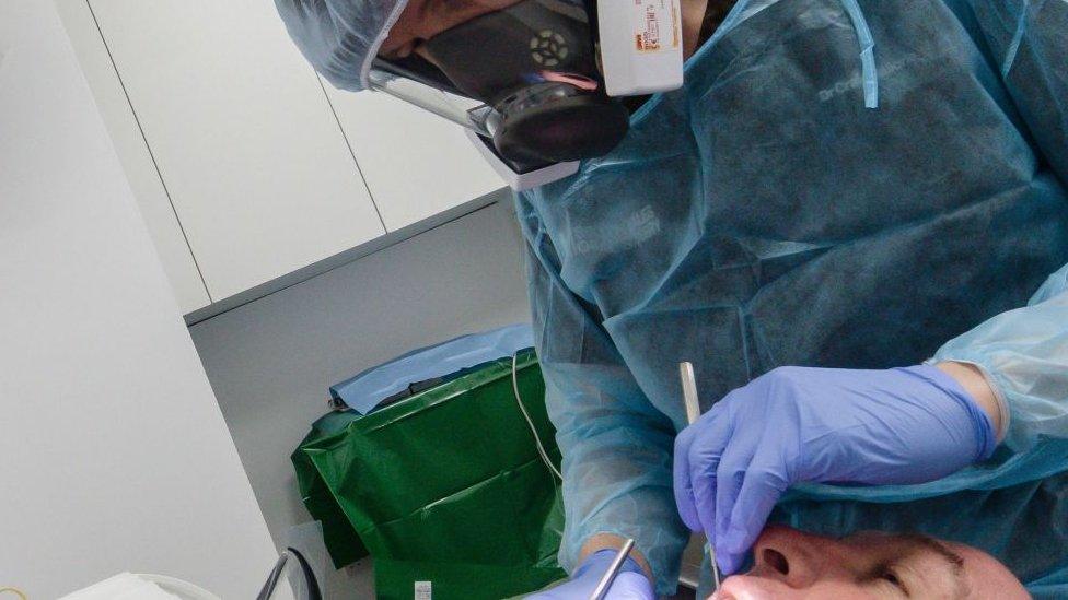 Dentist in full PPE