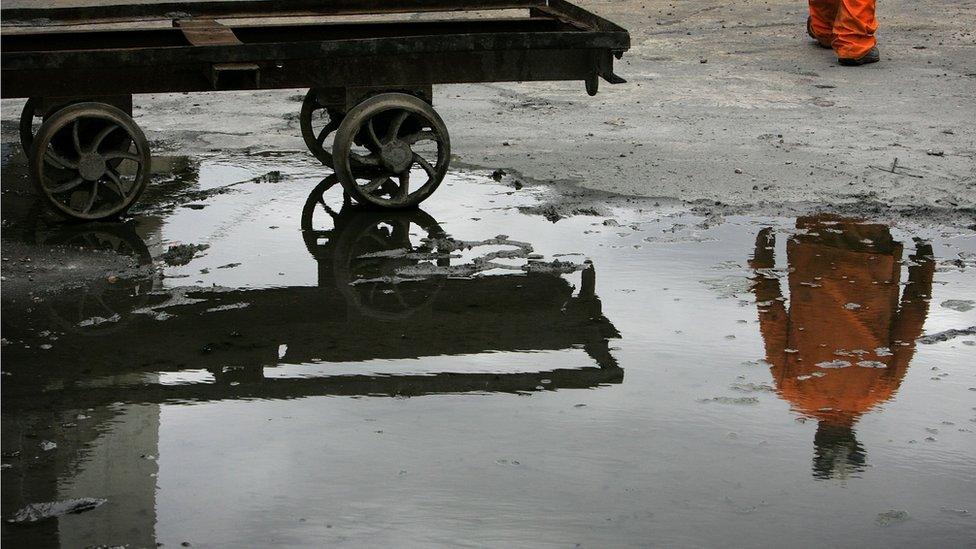 Reflection of a miner