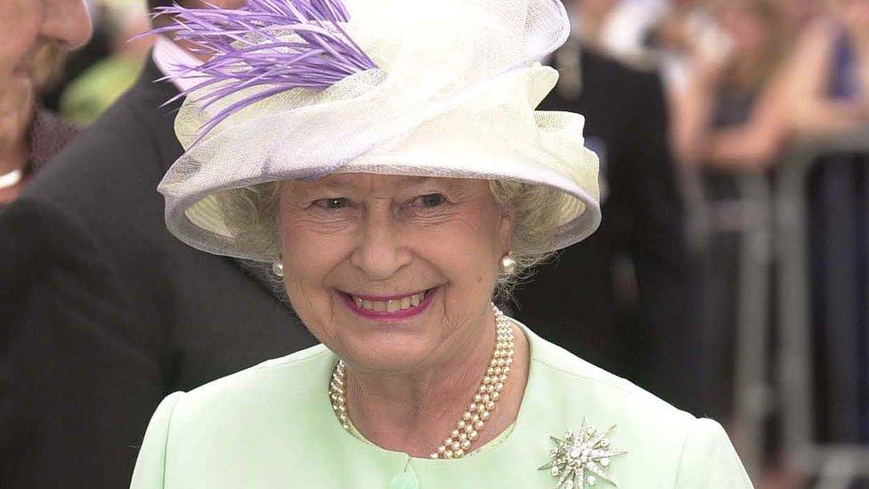 The Queen smiling during a visit to Bournemouth Pier in 2004 (Photo by Pool/Tim Graham Picture Library/Getty Images)