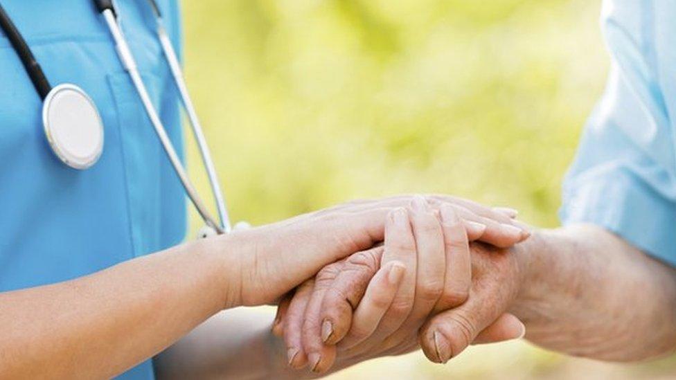 A nurse with a patient (stock image)