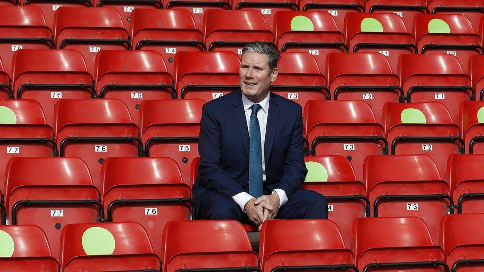 Sir Keir Starmer on a visit to Walsall football club