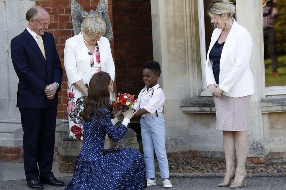 Kate, Duchess of Cambridge, is presented with flowers by Lawson Bischoff after visiting the D-Day exhibition at Bletchley Park on 14 May , 2019 in Bletchley, England. The D-Day exhibition marks the 75th anniversary of the D-Day landings