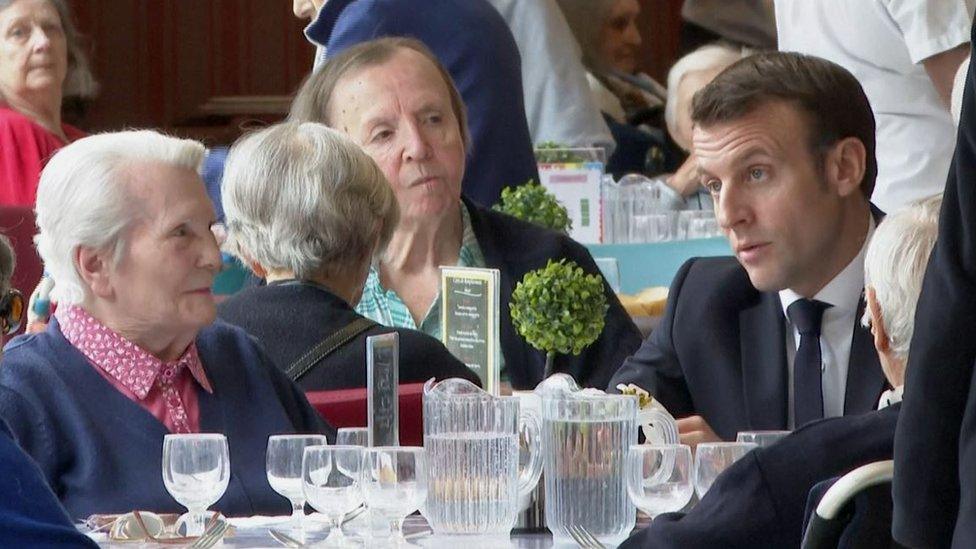 French President Emmanuel Macron visiting a care home in March 2020