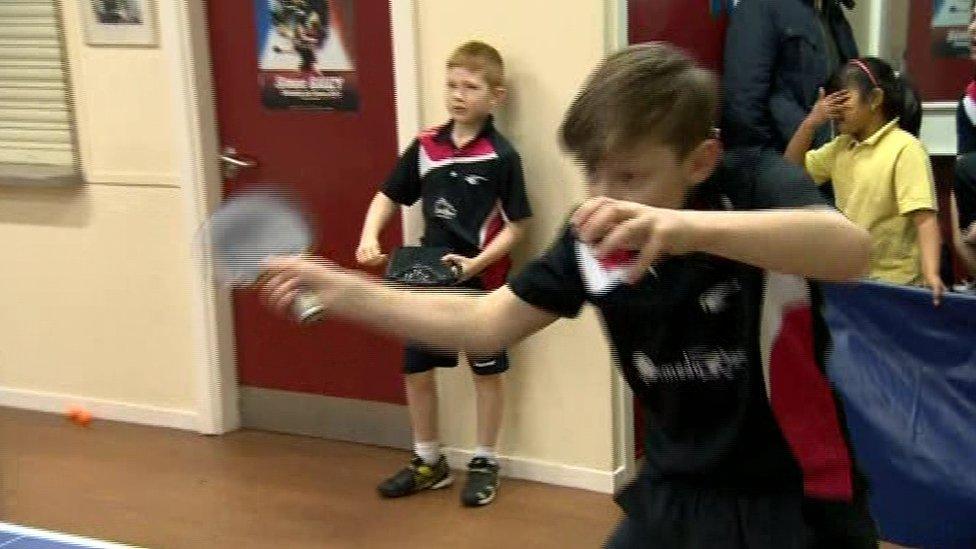 Owen Cathcart playing table tennis