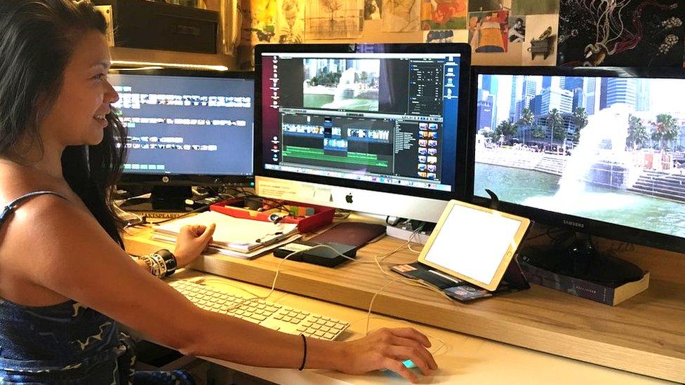 Ying Li Looi-Garman at her desk