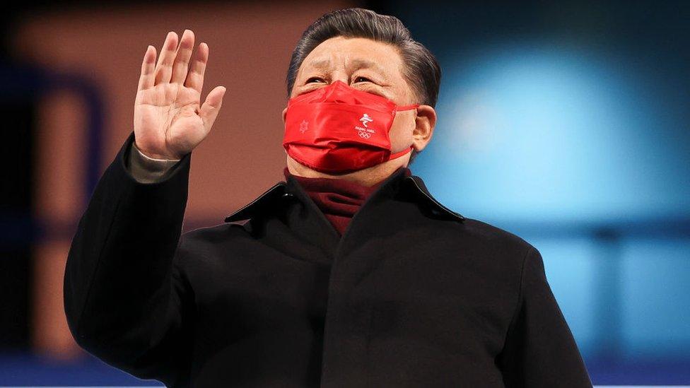 China's President Xi Jinping waves during the closing ceremony of the Beijing 2022 Winter Olympic Games, at the National Stadium, known as the Bird's Nest, on February 20, 2022 in Beijing, China.