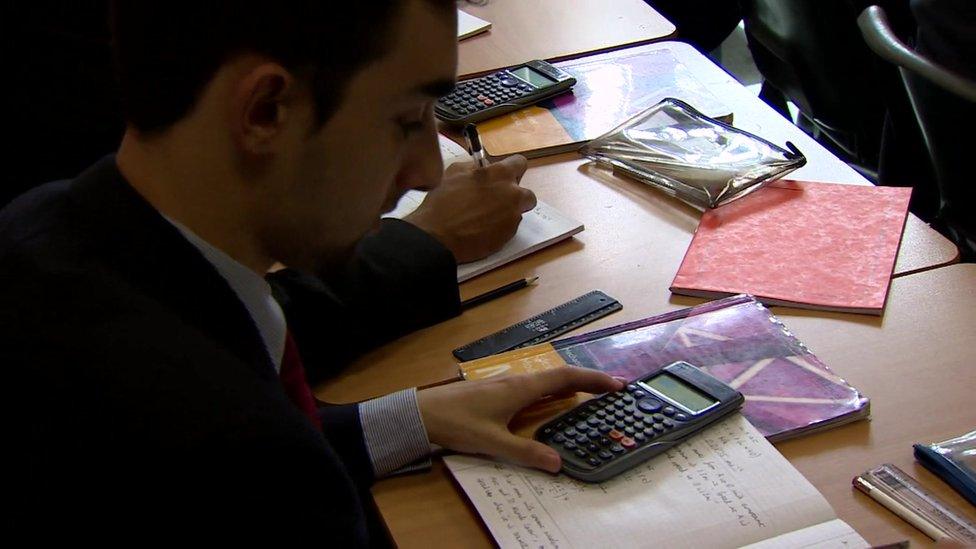 Boy with calculator