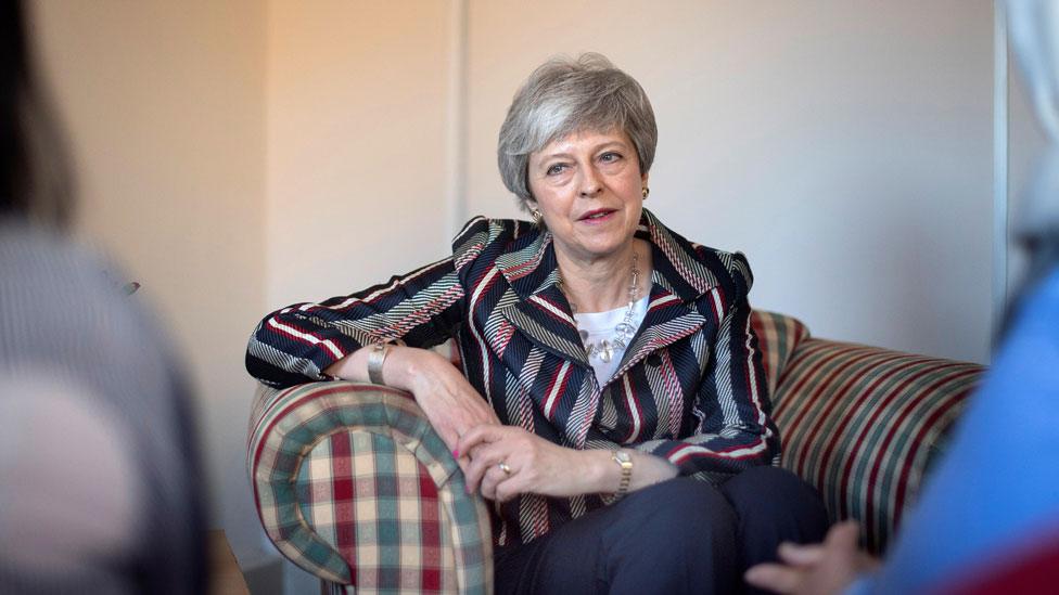 Theresa May at the Advance Charity offices in West London