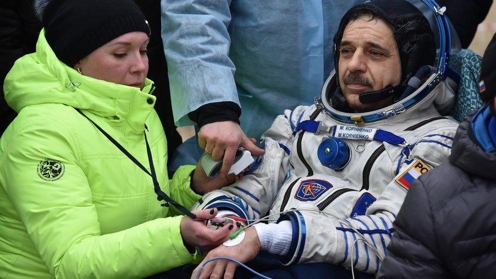 Cosmonaut Mikhail Kornienko after touchdown. 2 March 2016