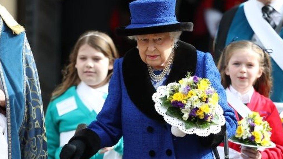 The Queen's nosegay was made up of daffodils, primroses, stocks, purple statice, freesias, rosemary and thyme with ivy leafs