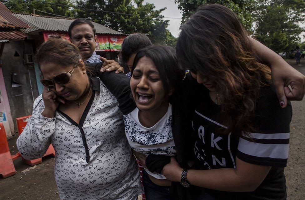 Brintha Sukumaran (C), a sister of Australian death row prisoner Myuran Sukumaran's screams as she arrives at Wijaya Pura port to visit her brother at Nusakambangan prison ahead of the executions of the Bali 9 on April 28, 2015 in Cilacap, Central Java, Indonesia. Condemned Bali Nine duo Andrew Chan and Myuran Sukumaran have been given 72 hours execution notice. The execution could be held as soon as Tuesday midnight on Nusukamban Island where they have been held, awaiting there fate since March 4th, 2015. Chan and Sukumaran were both sentenced to death after being found guilty of attempting to smuggle 8.3kg of heroin valued at around $4 million from Indonesia to Australia along with 7 other accomplices