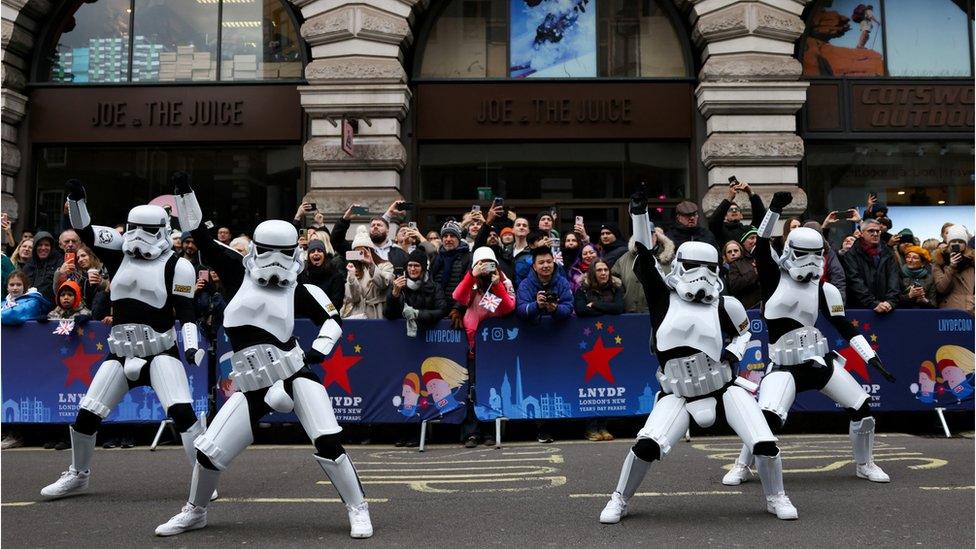 Stormtroopers dance in front of the crowd