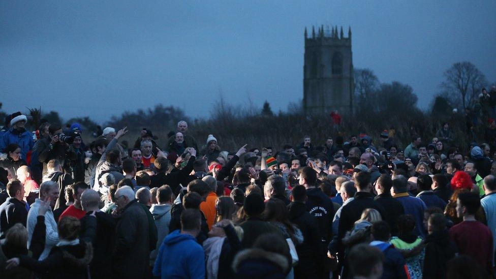 The 2016 Haxey Hood got under way as dusk fell