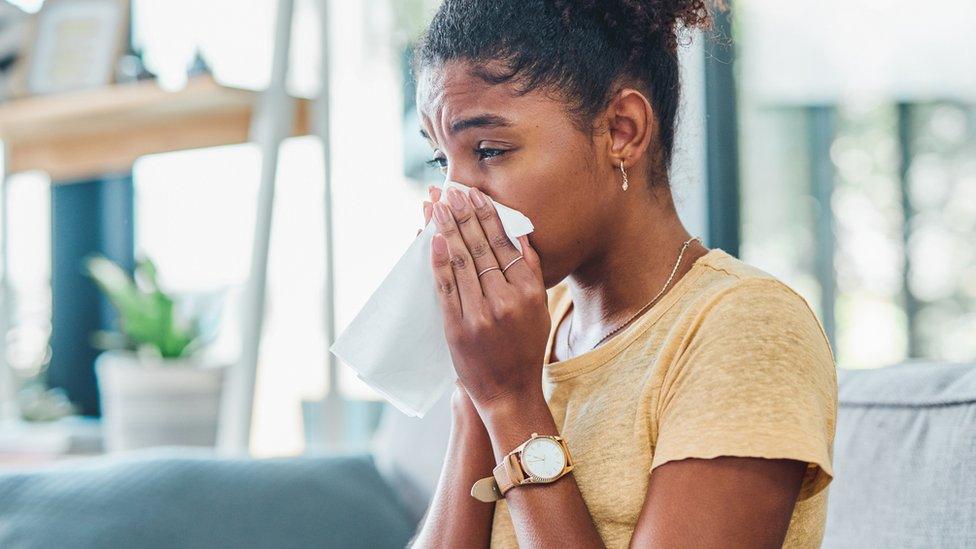 woman blocked nose