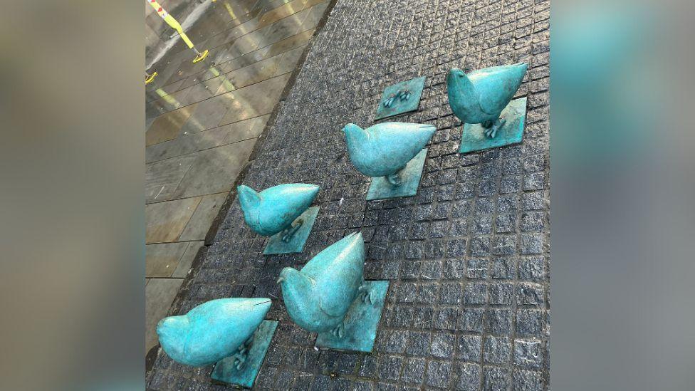 One of the eight Elm Row pigeon sculptures has been removed months after its return from a 17-year absence