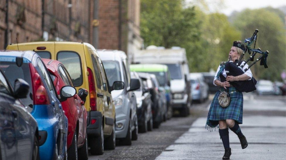 Piper Louise Marshall performed in Leith, Edinburgh, walking up and down her street to entertain everyone!