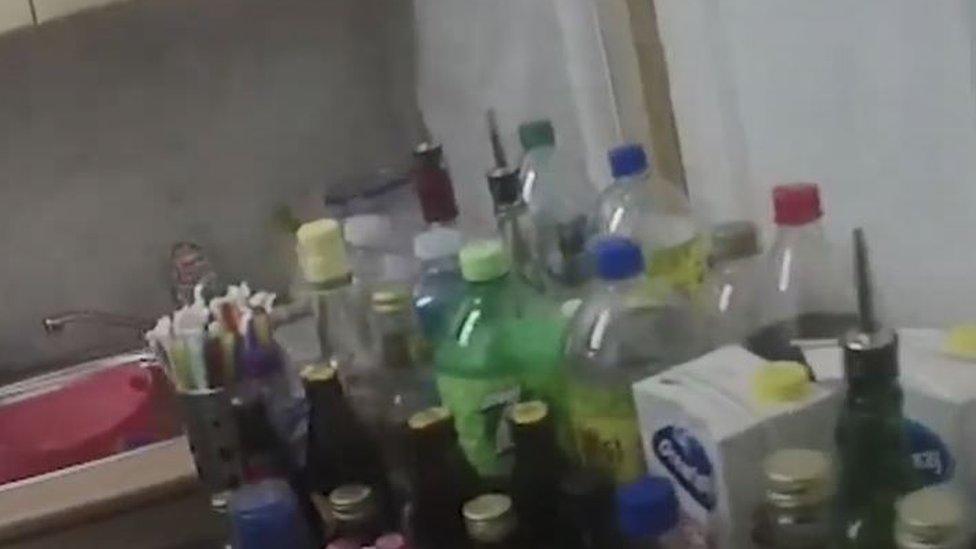 Bottles of pop and alcohol