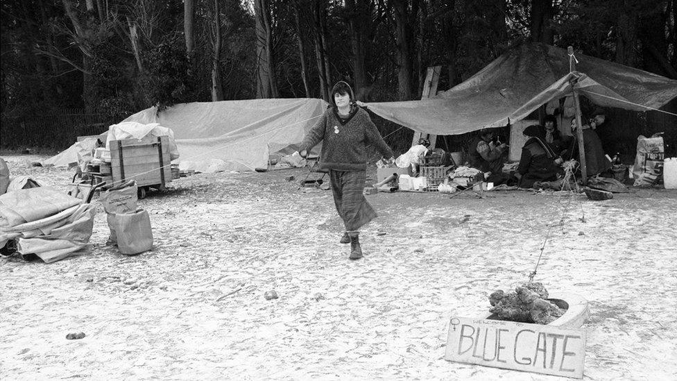 Woman on blue gate camp