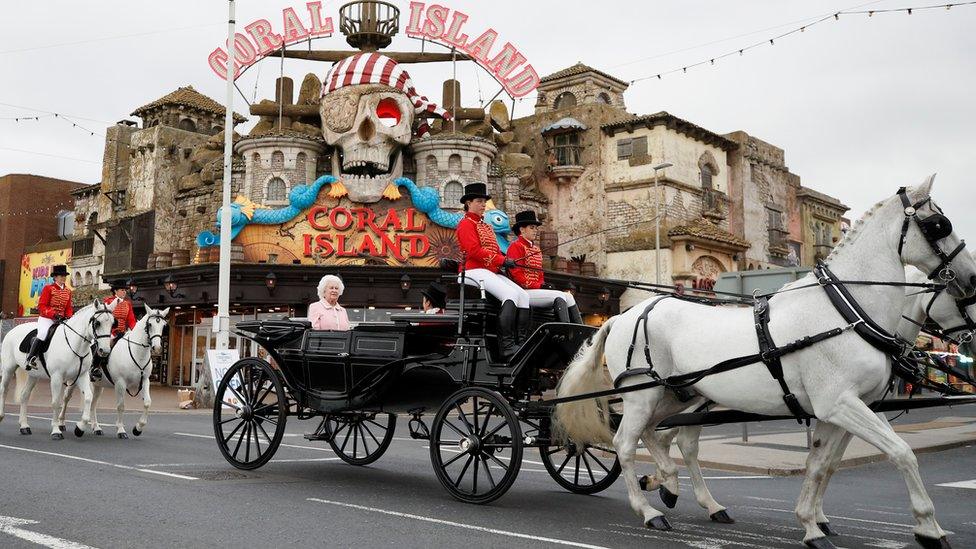 The Queen waxwork arriving in horse and carriage