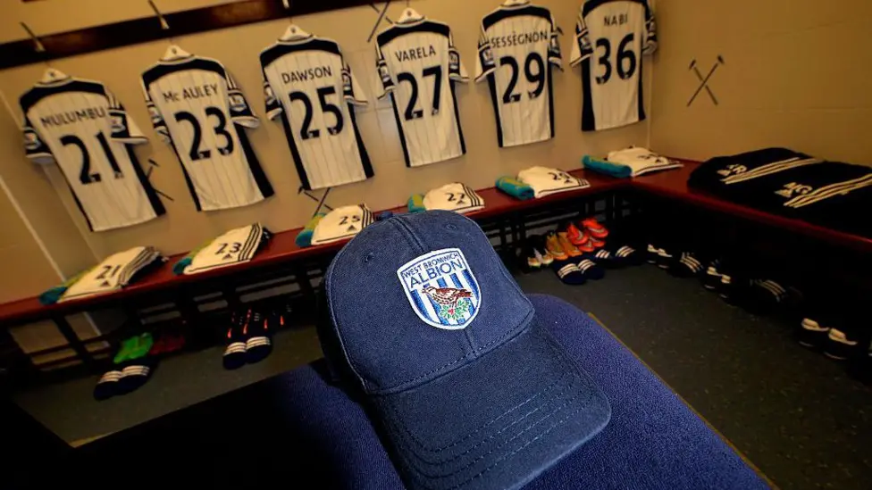 The West Brom dressing room before a game against West Ham in 2015. No sign of Pulis, but his famous baseball cap is ready and waiting