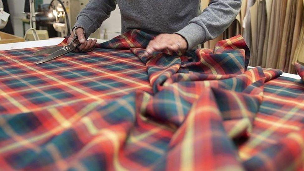 Vegan tartan being cut