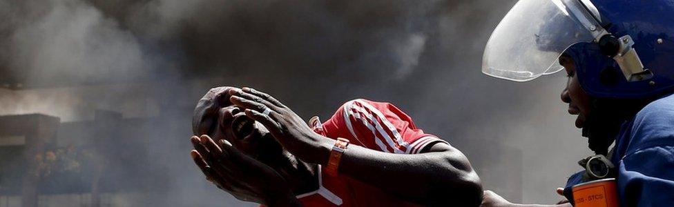 A protester cries as he his detained during a protest in Burundi. File photo