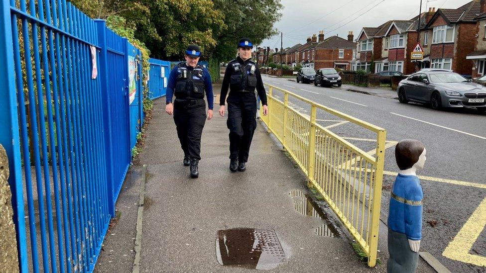 Police officers outside school