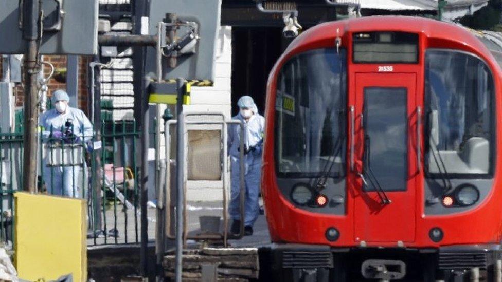 Forensic officers at a London Underground train