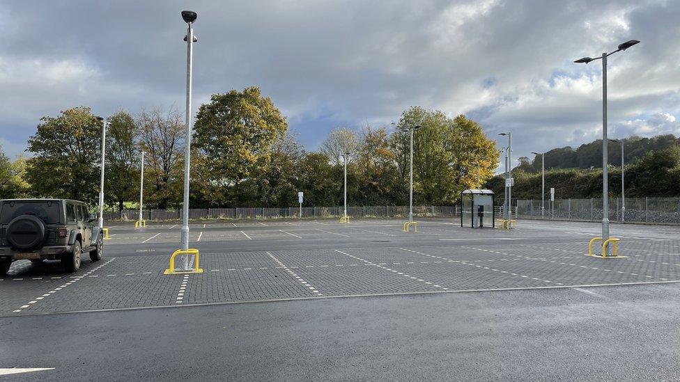 Castle Cary car park, newly surfaced with only one car parked in it.