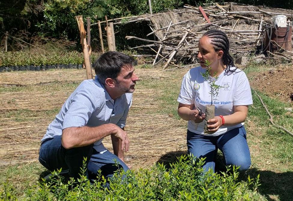 Justin and Sarah examine seedlings