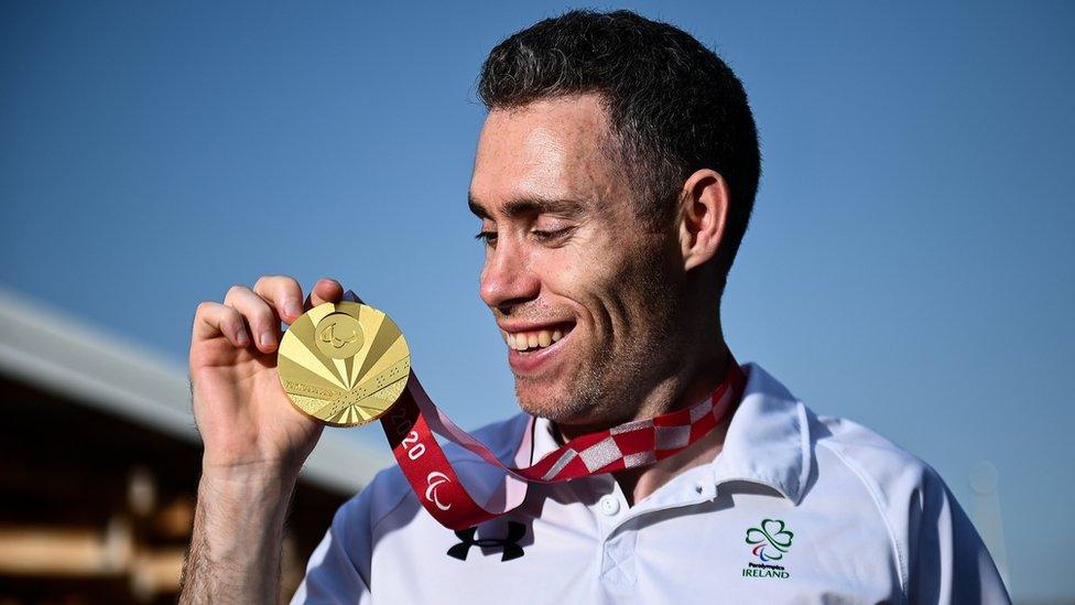 Jason Smyth displays his gold medal