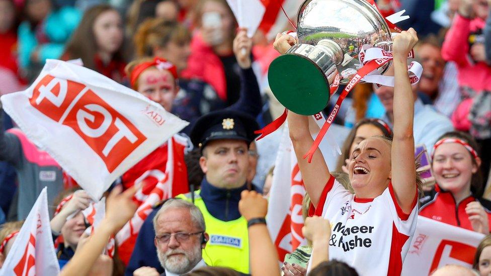 Neamh Woods lifts the Mary Quinn Cup after Tyrone's 6-08 to 1-14 victory over Meath