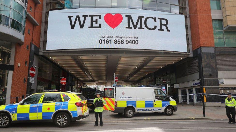 A large sign reading "We love Manchester"