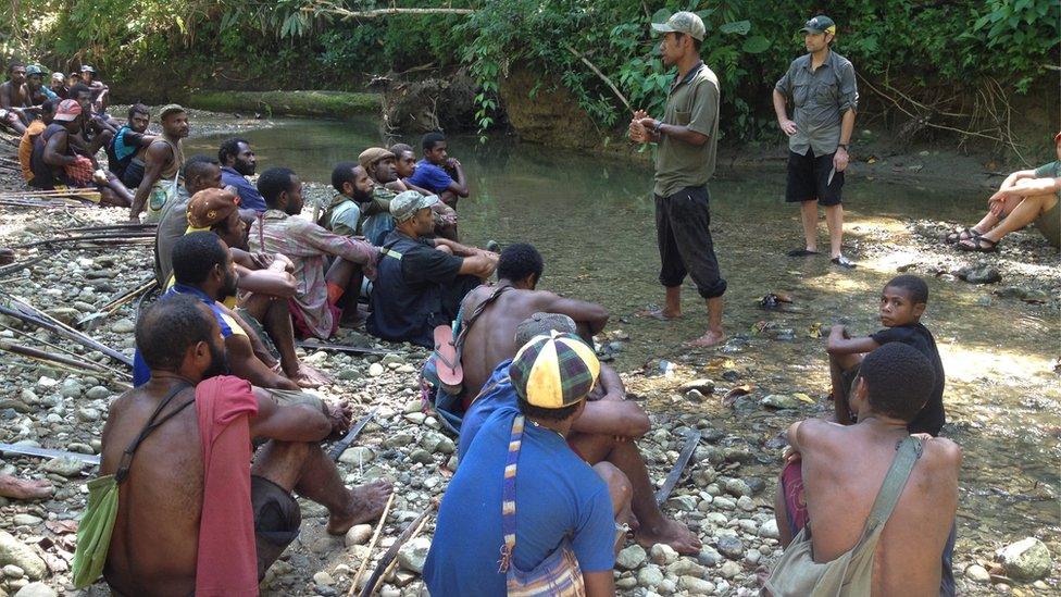 Researchers speak to people in Aitape, Papua New Guinea