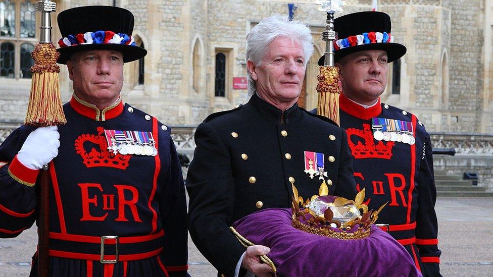 Bruno Peek returns to the Jubilee Crystal Diamond used to light the beacons in 2012 to the Tower of London