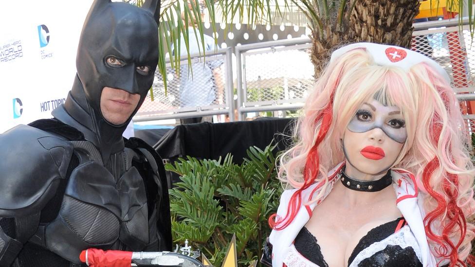 Actress/cosplayer Diana Terranova dressed as Harley Quinn with a cosplayer dressed as Batman at the Warner Bros and DC Comics Super Hero World Record Event in Hollywood in 2018