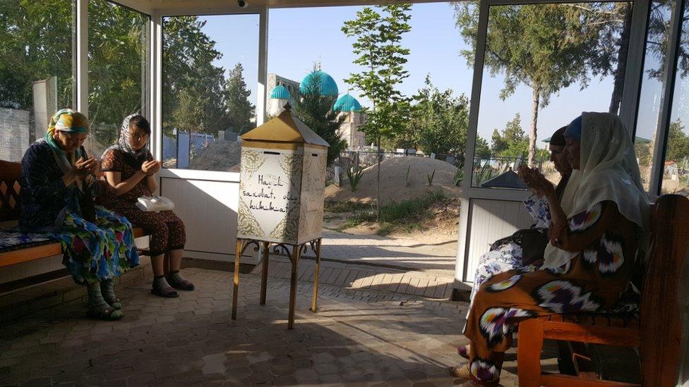 Women praying at the popular Zangi-ota shrine near the capital Tashkent