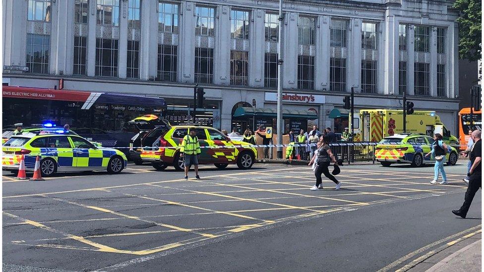 Police cars outside Cardiff city centre