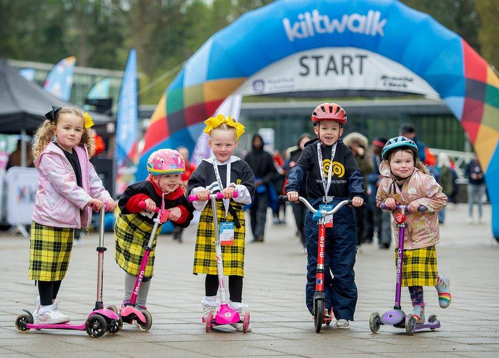 Children on scooters