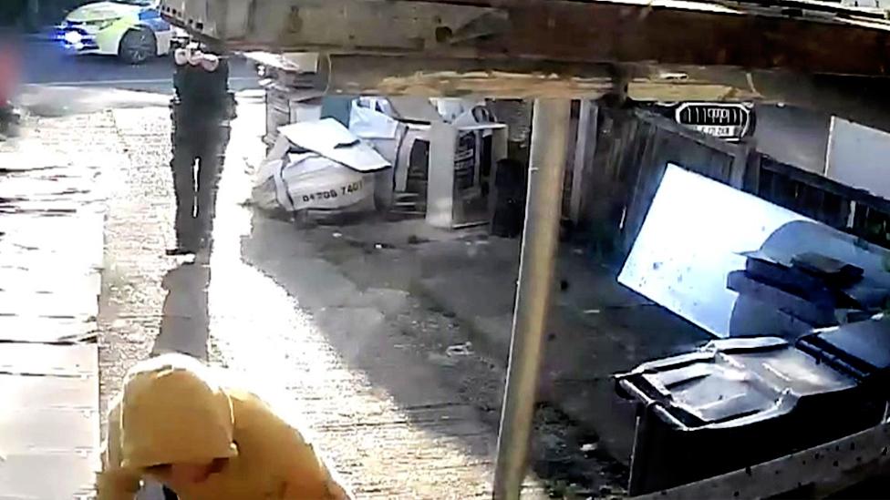 Man being confronted by police
