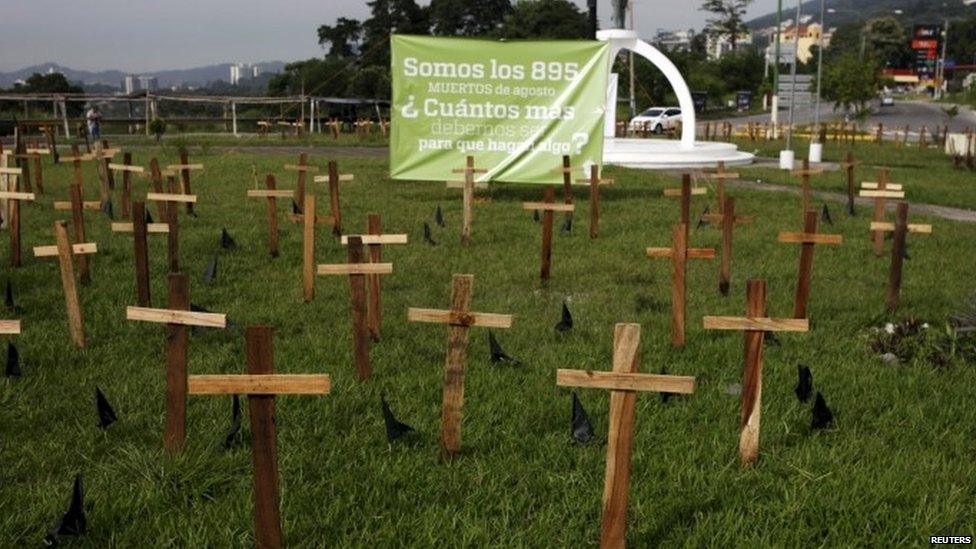 Crosses are left as a protest against the high homicide rate in the country in San Salvador, El Salvador on September 1, 2015.