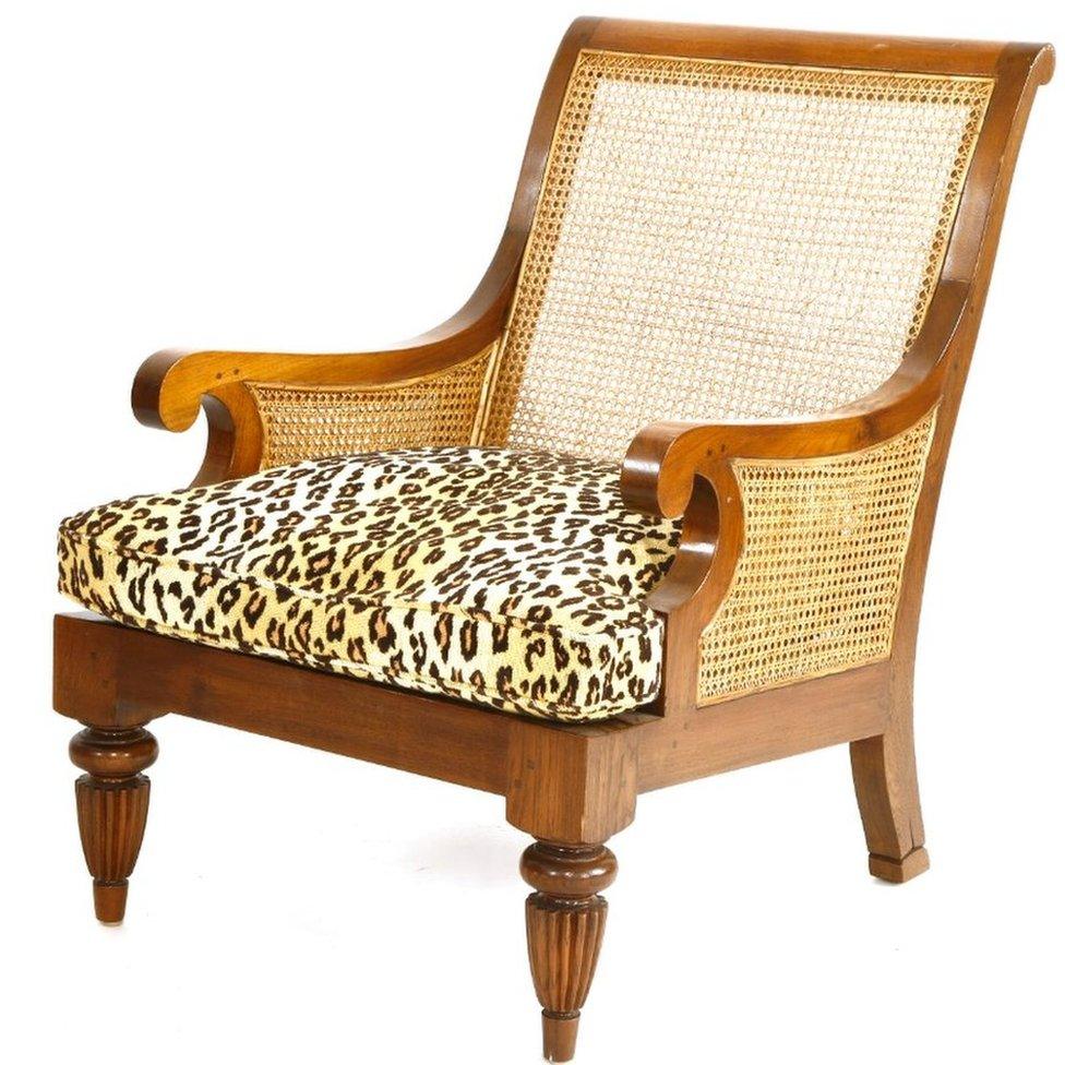 A teak lounge armchair