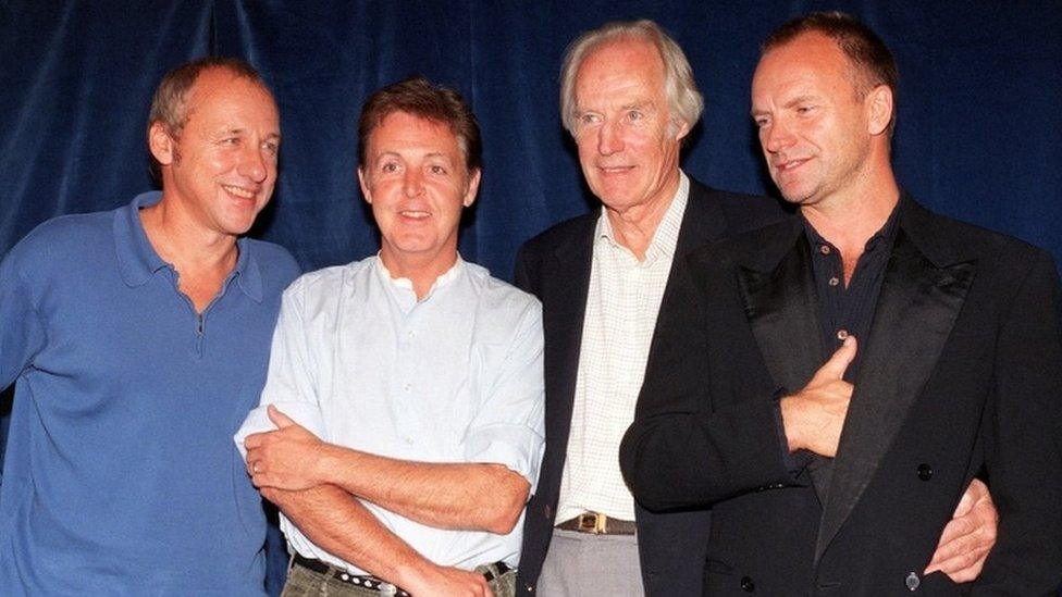 Mark Knopfler, Sir Paul McCartney, Sir George Martin and Sting at a Music for Montserrat benefit concert in 1997