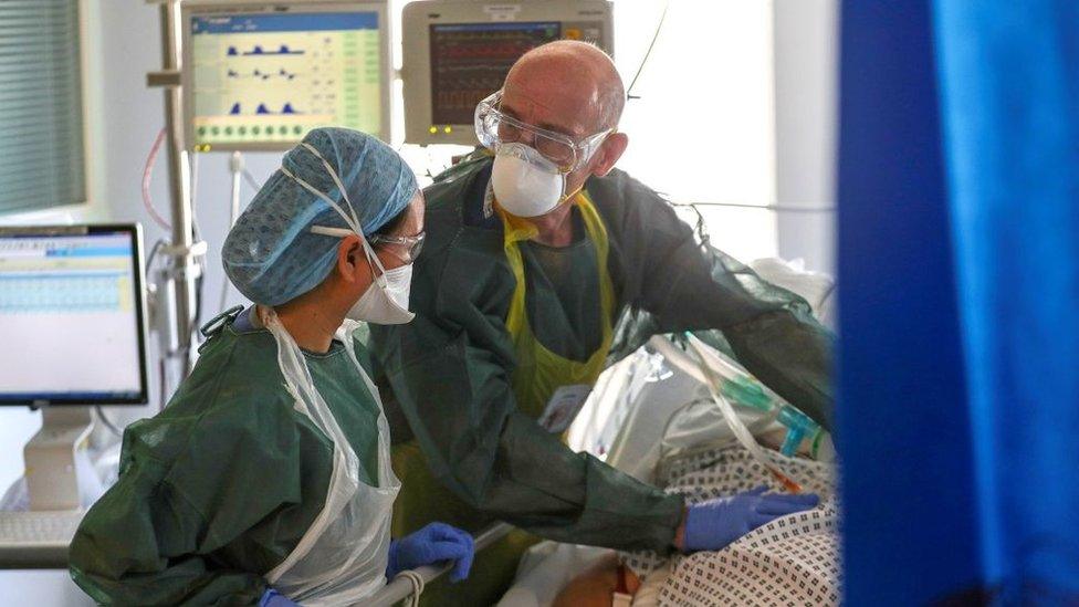 Medical staff treating a Covid-19 patient at Frimley Park Hospital