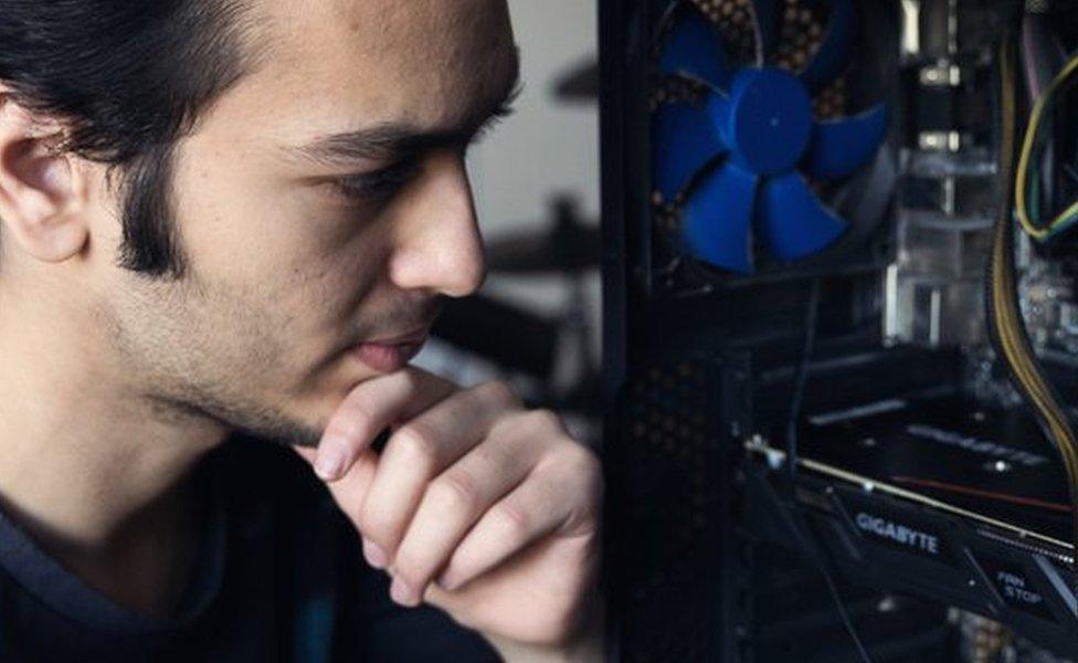 Abdelrhman Badr with his computer