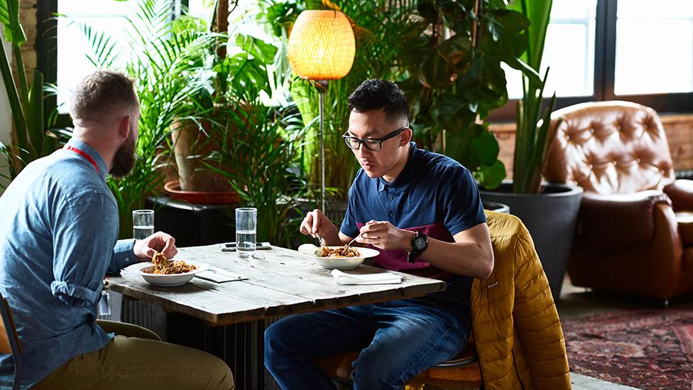 Two men having a working lunch