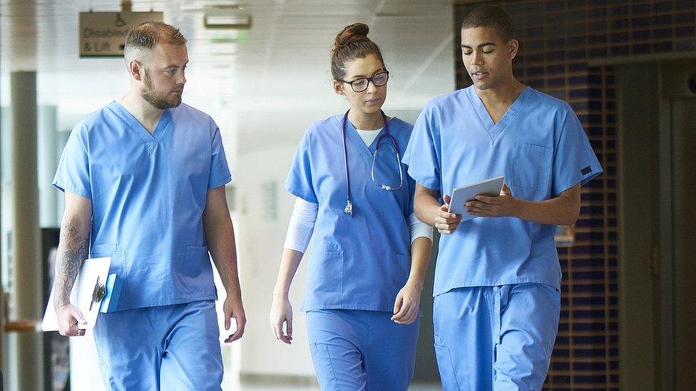 Stock picture of three junior doctors