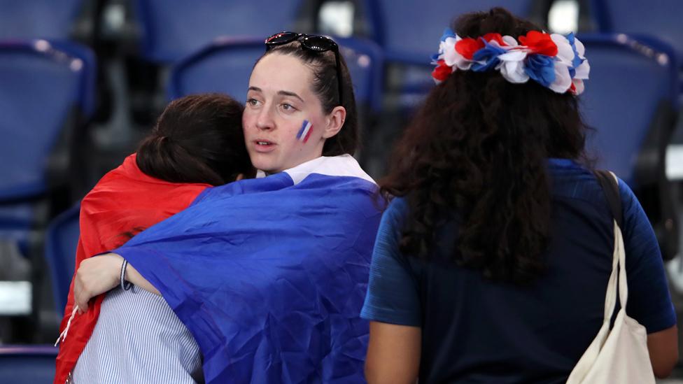 French fans after their loss to the USA